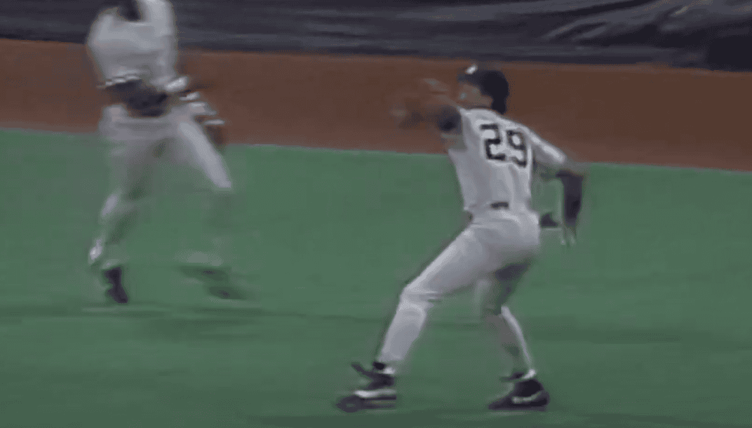 Jesse Barfield showcasing his powerful throwing arm during a game in the '80s.